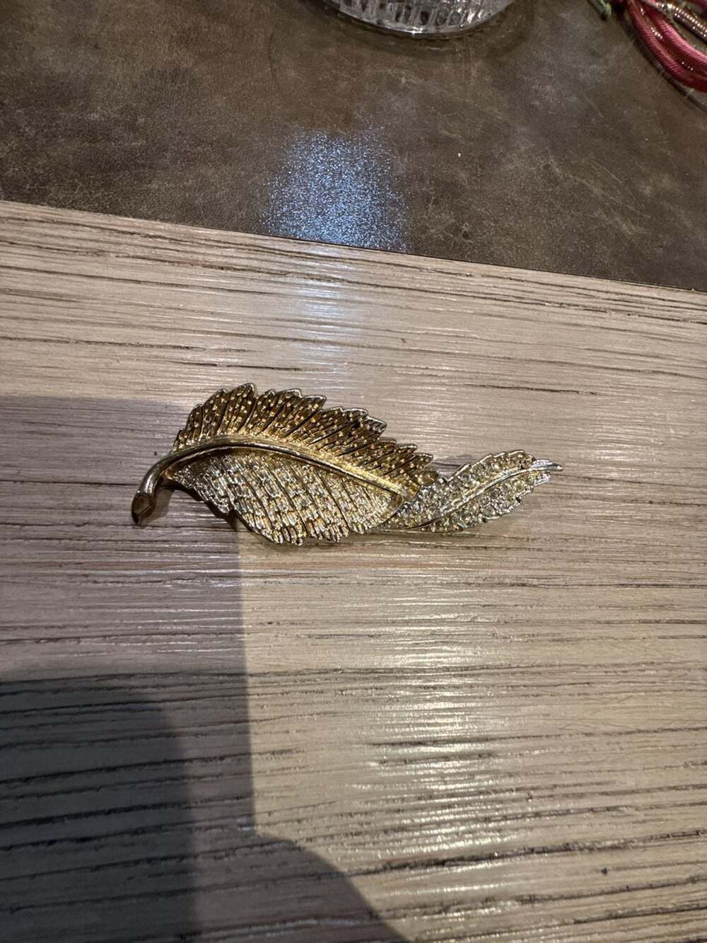 Sarah Coventry Fashion Leaf Clear Rhinestone Textured Gold Tone Pin Brooch